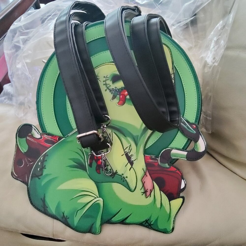 NIGHTMARE BEFORE CHRISTMAS OOGIE BOOGIE GLOWS BACKPACK RETIRED NWT - Picture 6 of 12